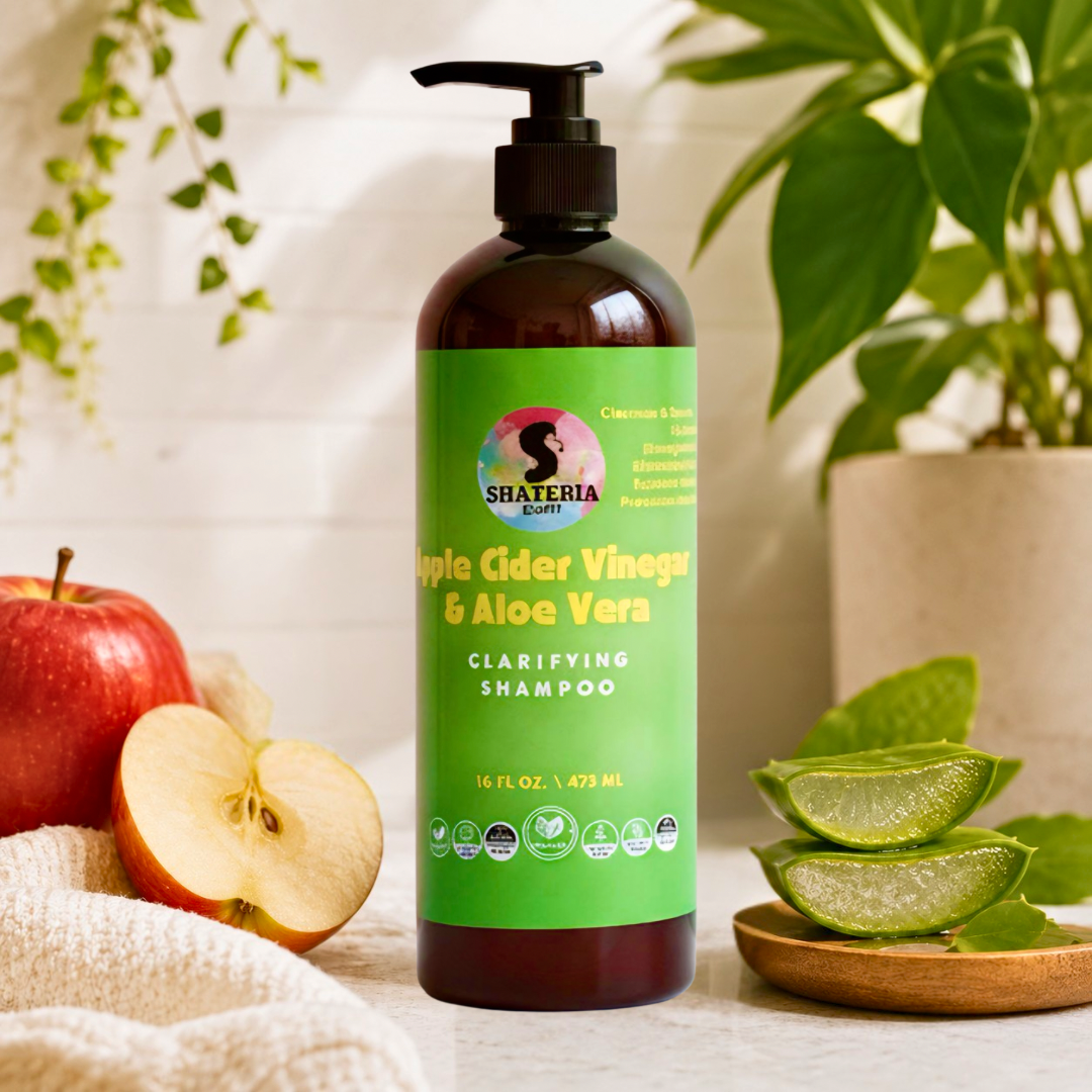 Shateria Beauty Apple Cider Vinegar & Aloe Vera Clarifying Shampoo with fresh apples and aloe vera, representing plant-based scalp and hair care for curls, locs, relaxed, and color-treated hair.